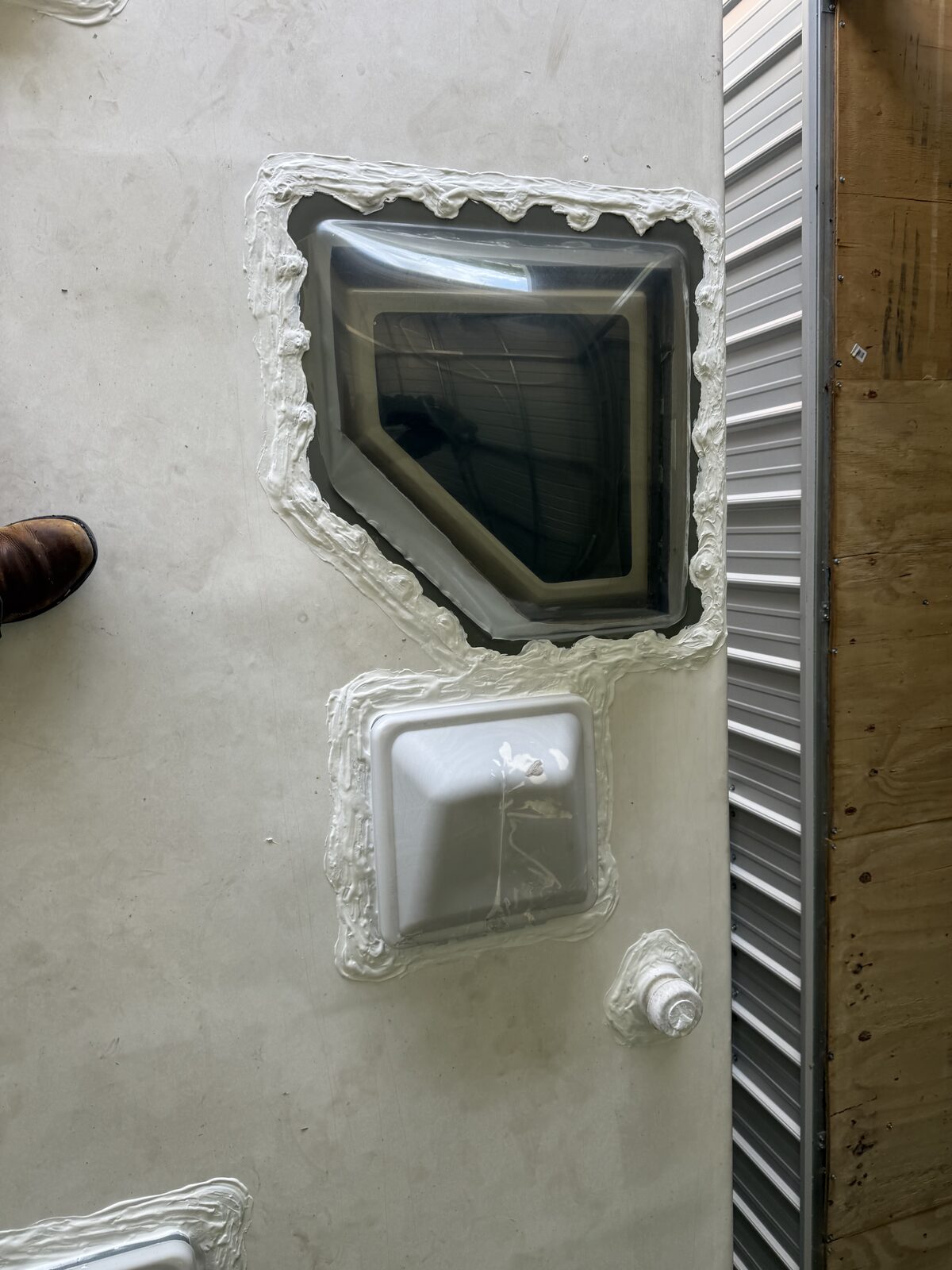 RV window and vent frames resealed with fresh butyl and sealant
