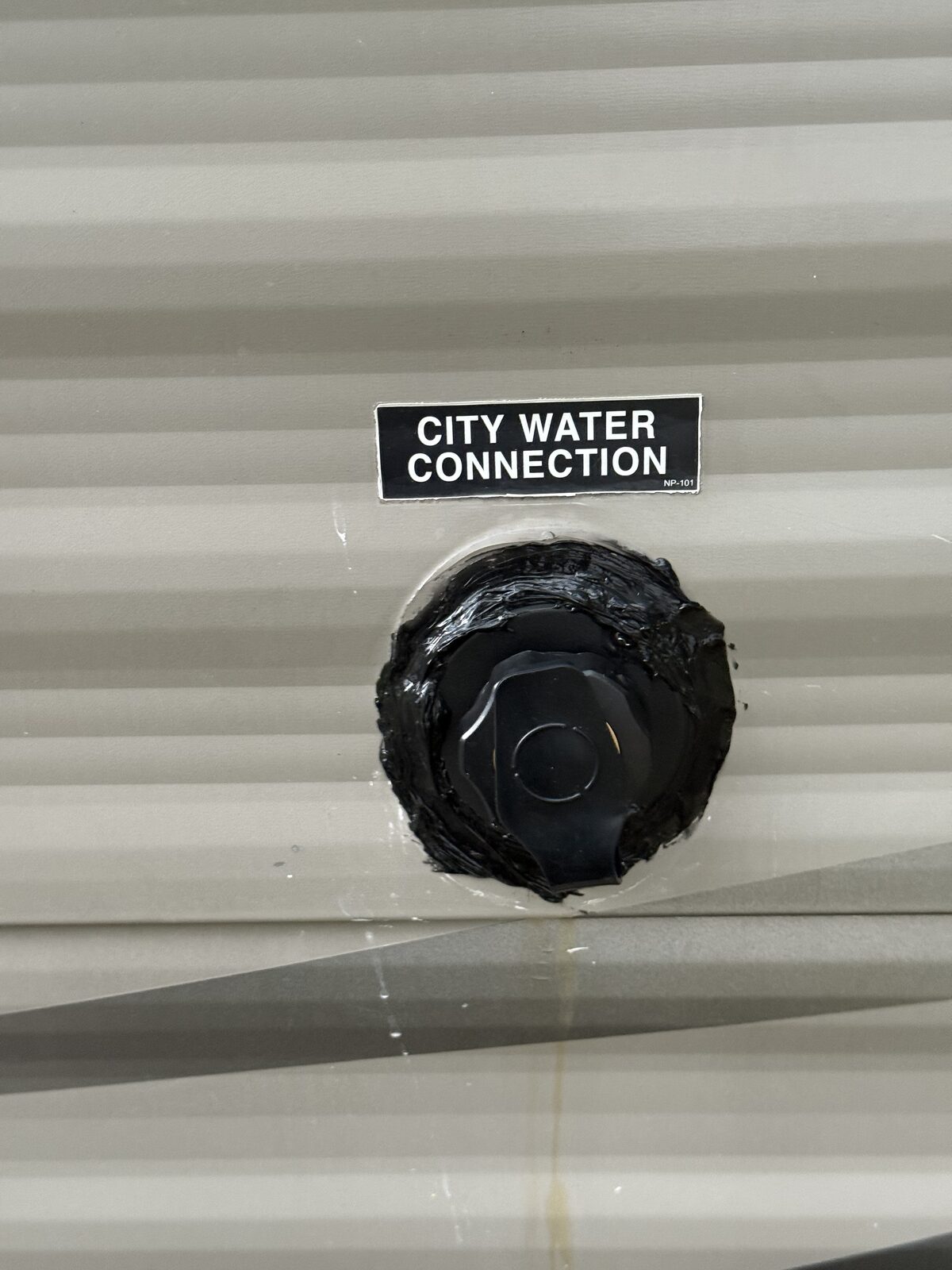 RV city water connection resealed on the sidewall